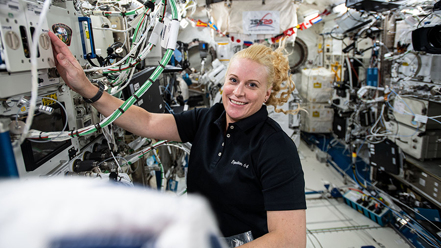 Expedition 64 Flight Engineer Kate Rubins works on research hardware inside the Kibo laboratory module.