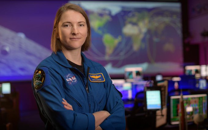 NASA astronaut Kayla Barron poses for a portrait, Wednesday, Sept. 16, 2020, in the Blue Flight Control Room at NASA's Johnson Space Center in Houston