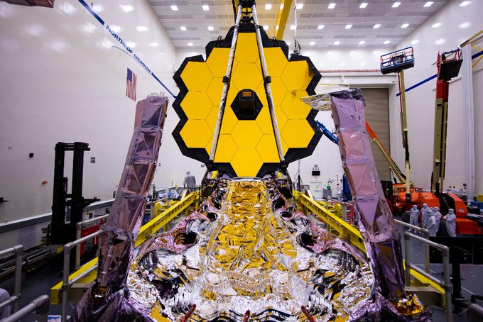 James Webb Space Telescope in facility with primary mirror deployed and sunshield folded