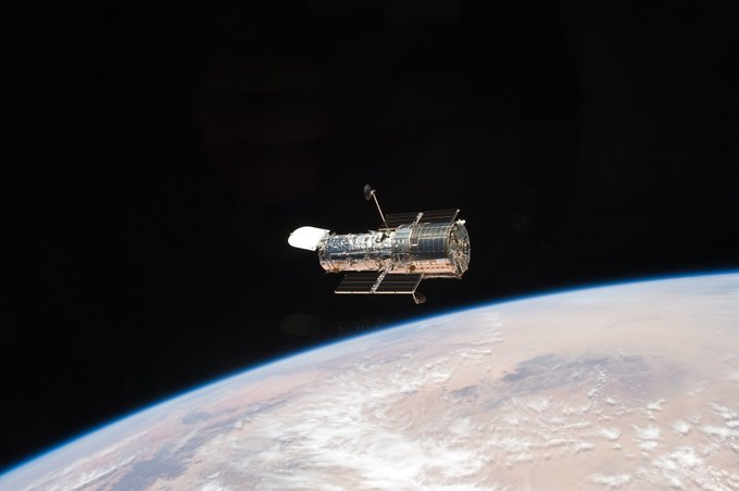 The Hubble Space Telescopes orbits above Earth