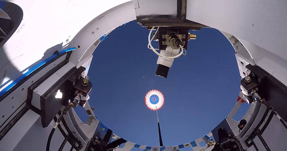 A reused drogue parachute deploys from Boeing's CST-100 Starliner test article