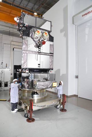 Northrop Grumman personnel examine the U.S. Space Force Space and Missile Systems Center's Space Test Program Satellite 6 at its facility in Dulles, Virginia, prior to its shipment to Florida for final launch processing.