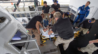 NASA astronaut Doug Hurley, along with teams from NASA and SpaceX, rehearse crew extraction from SpaceX's Crew Dragon