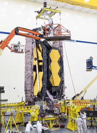 Teams lifted JWST for the first time to prepare it for transport.