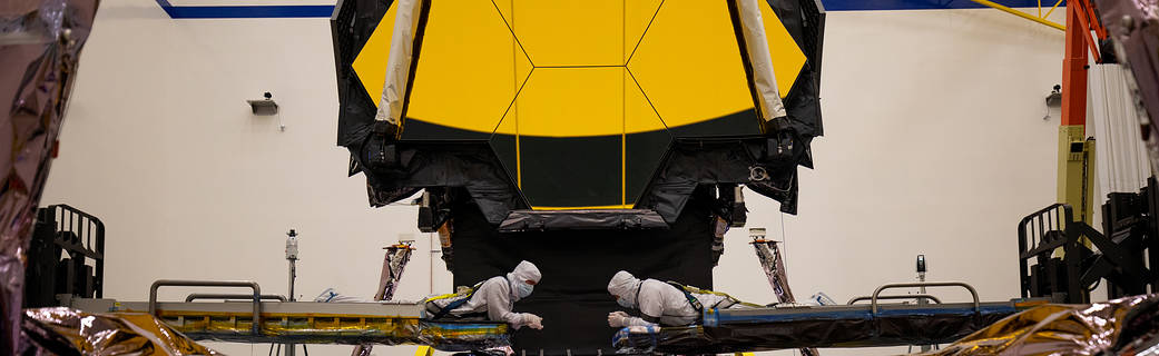 Technicians inspect a critical part of the James Webb Space Telescope known as the Deployable Tower Assembly