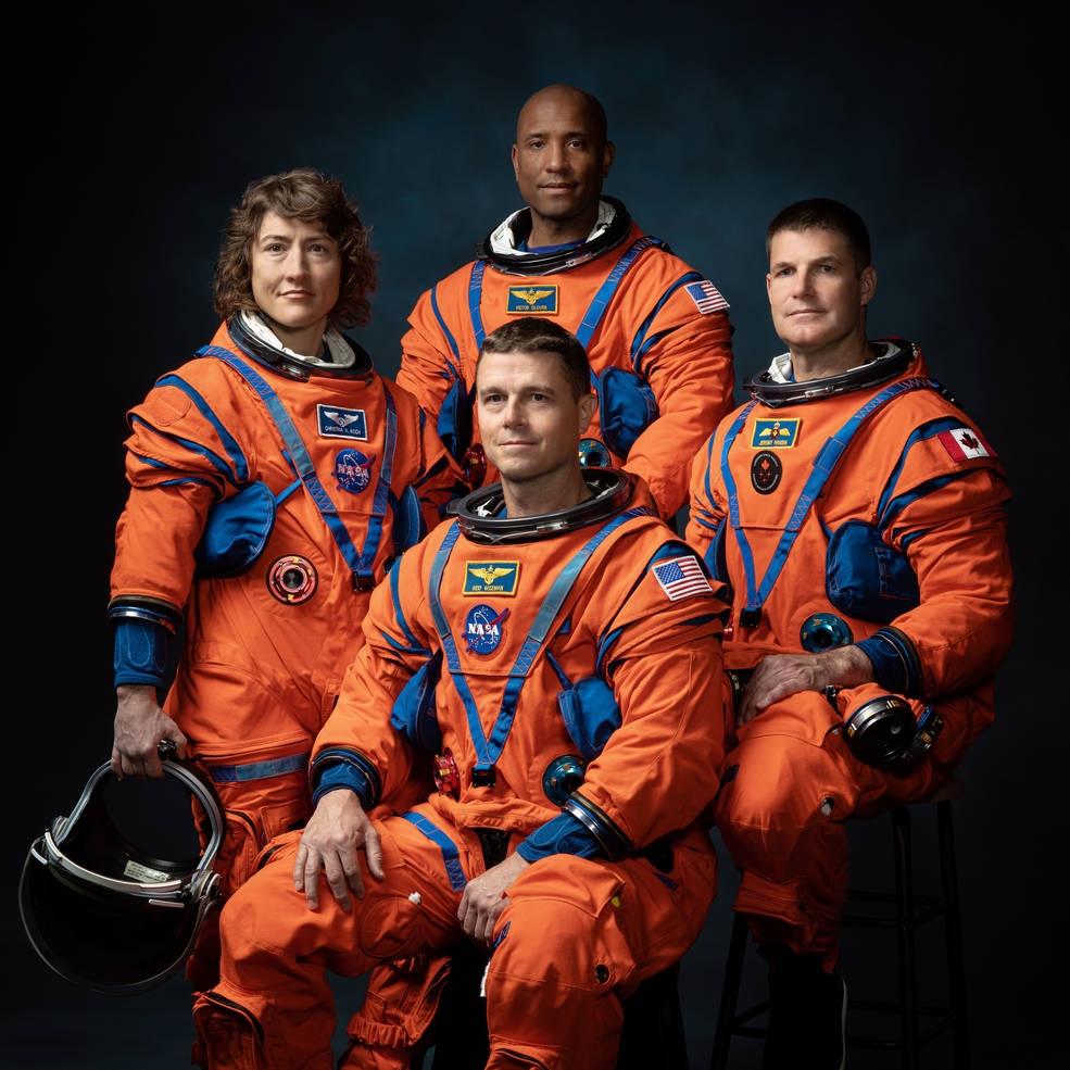 The crew of NASA's Artemis II mission (left to right): Christina Hammock Koch, Reid Wiseman (seated), Victor Glover, and Jeremy Hansen.