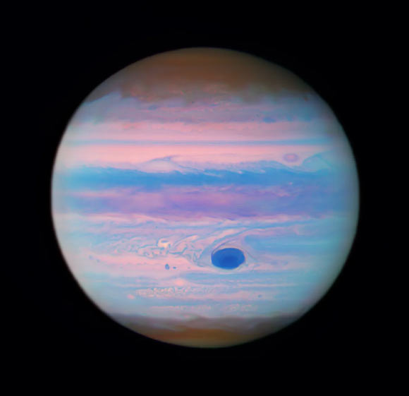 This Hubble image shows Jupiter in ultraviolet light. Image credit: NASA / ESA / Hubble / M. Wong, University of California, Berkeley / Gladys Kober, NASA & Catholic University of America.