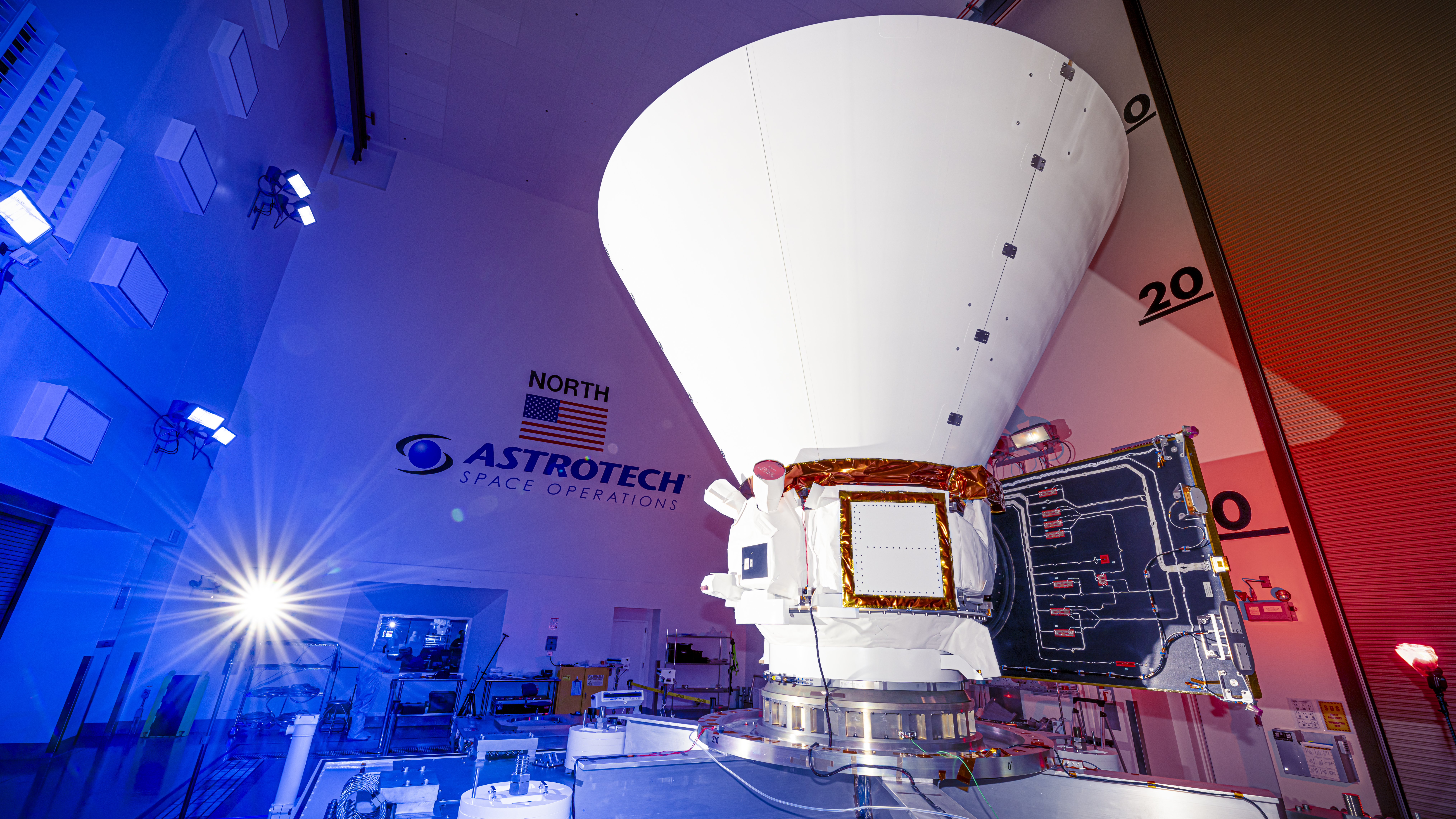 NASA's SPHEREx (Spectro-Photometer for the History of the Universe, Epoch of Reionization and Ices Explorer), a space telescope, is situated on a work stand ahead of prelaunch operations at the Astrotech Processing Facility at Vandenberg Space Force Base in California on Thursday, Jan. 16, 2025. SPHEREx will enter a polar orbit around Earth and create a 3D map of the entire sky, gathering information about millions of galaxies for scientists to study what happened after the big bang, the history of galaxy evolution, and the origins of water in planetary systems in our galaxy.
